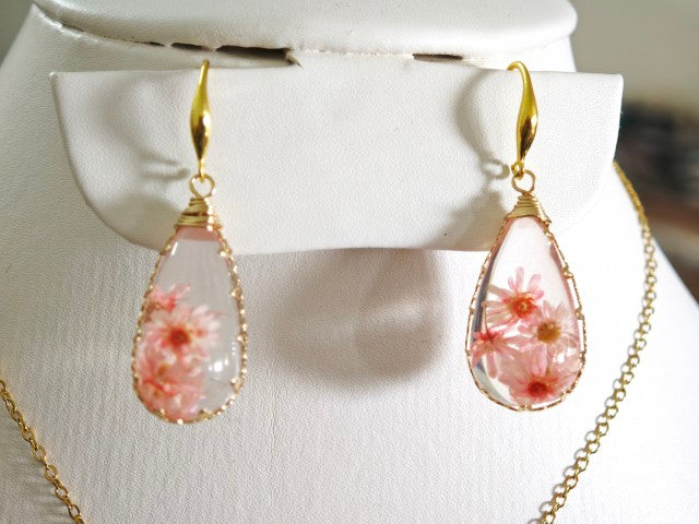 Sapraa Trends Unique Resin Drop Earrings in Gold Mould with real flowers preserved in Pink