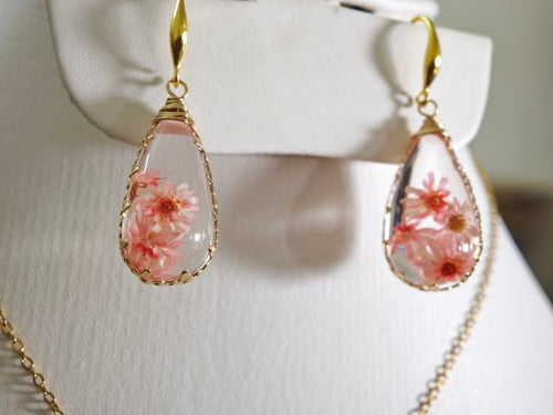Sapraa Trends Unique Resin Drop Earrings in Gold Mould with real flowers preserved in Pink