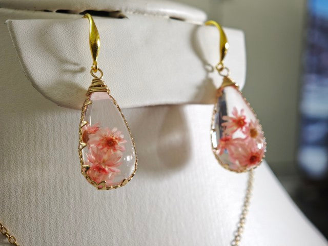 Sapraa Trends Unique Resin Drop Earrings in Gold Mould with real flowers preserved in Pink