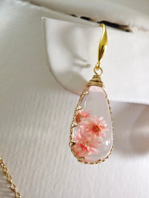 Sapraa Trends Unique Resin Drop Earrings in Gold Mould with real flowers preserved in Pink